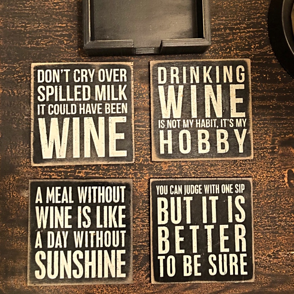 4 Coasters & holder with Wine sayings